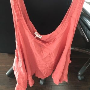 Large free people tank shirt with a small spot